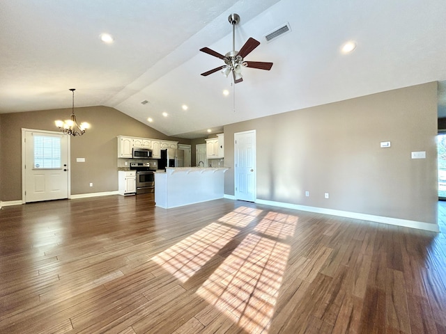 unfurnished living room with vaulted ceiling, dark hardwood / wood-style floors, and ceiling fan with notable chandelier