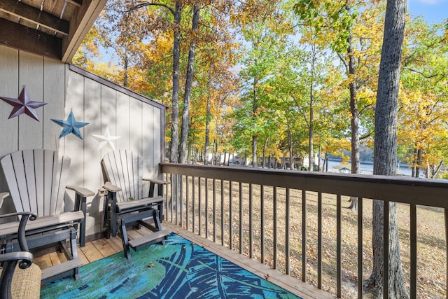 deck featuring a water view