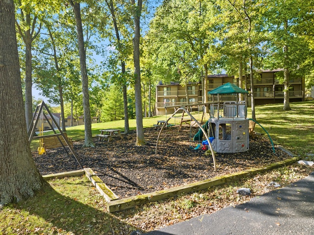 view of play area featuring a lawn