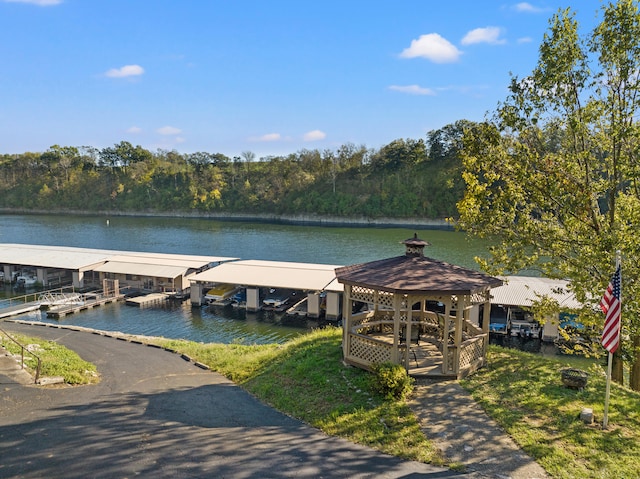 view of dock featuring a water view and a gazebo