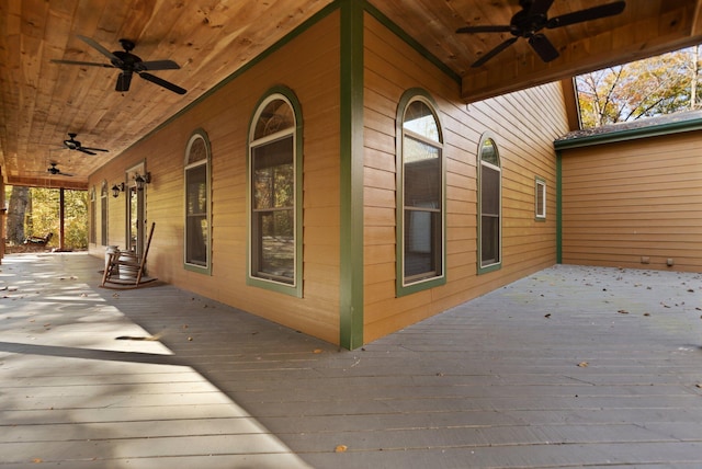 wooden terrace with ceiling fan