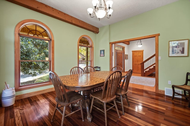 dining room with visible vents, dark wood finished floors, stairs, a chandelier, and beam ceiling