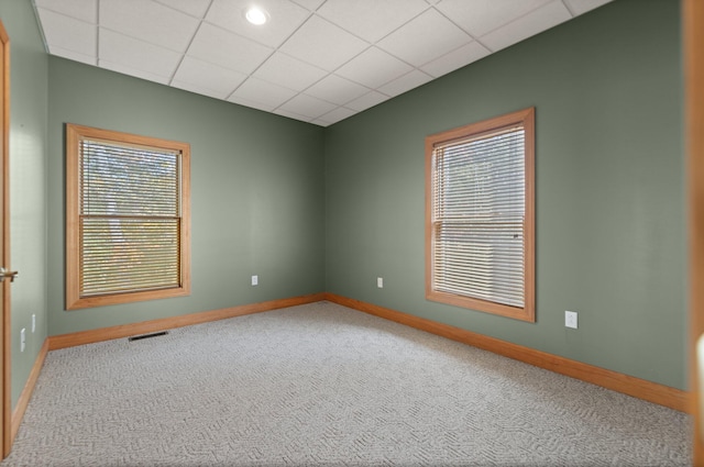 270 Wondering Woods Dr, Somerset, KY 42503 - carpeted empty room featuring baseboards, plenty of natural light, and a paneled ceiling