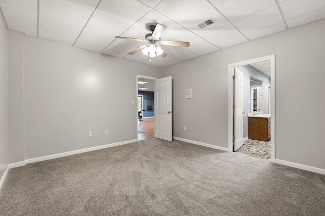 270 Wondering Woods Dr, Somerset, KY 42503 - unfurnished bedroom featuring a paneled ceiling, carpet flooring, baseboards, ensuite bath, and ceiling fan