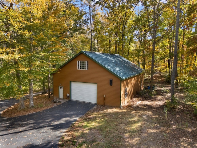 exterior space featuring a detached garage