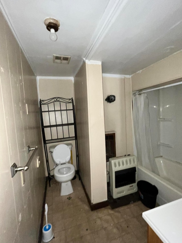 full bathroom with toilet, heating unit, vanity, shower / tub combo with curtain, and ornamental molding