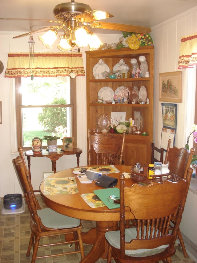 dining space featuring ceiling fan