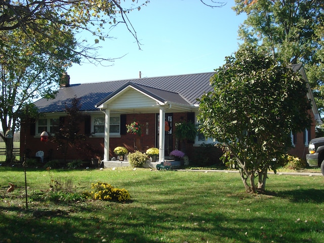 ranch-style house with a front yard