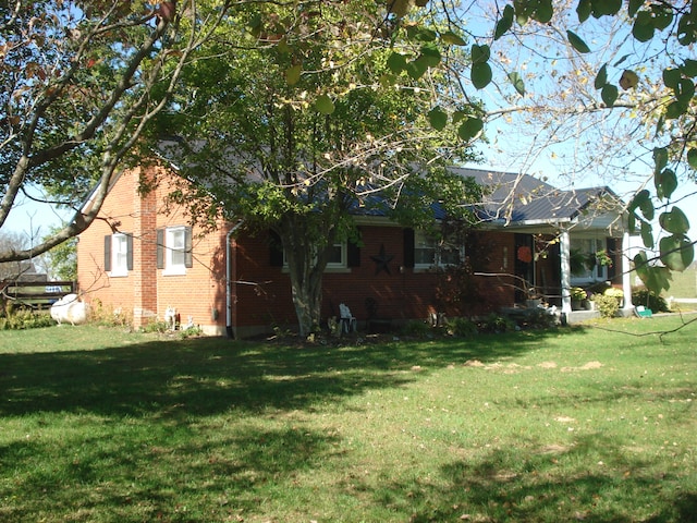 exterior space featuring a yard