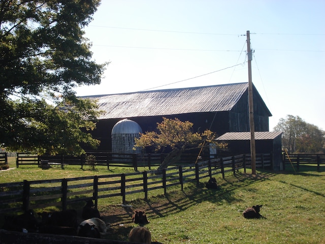 exterior space with a rural view