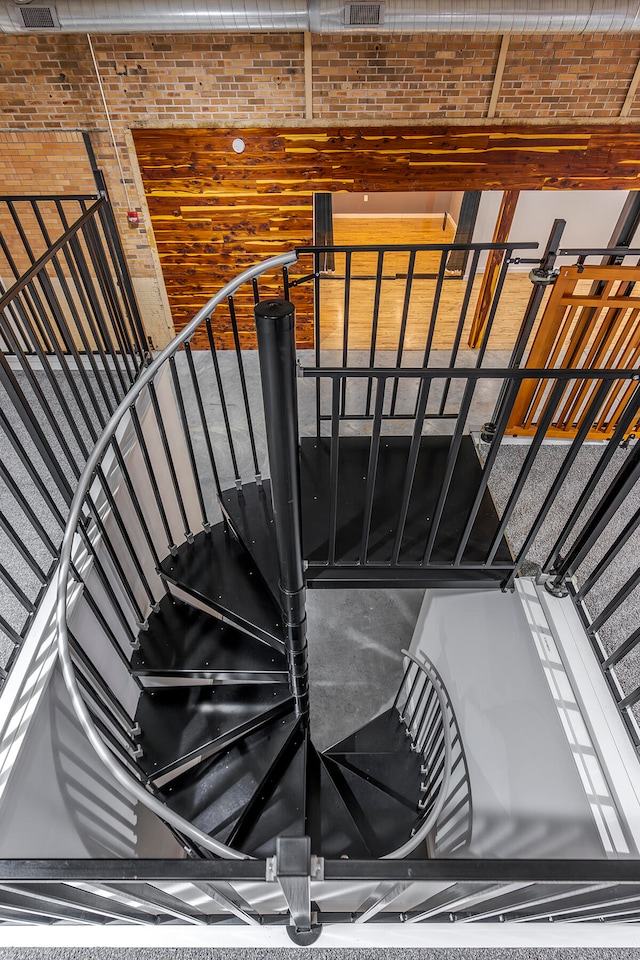 stairs with brick wall