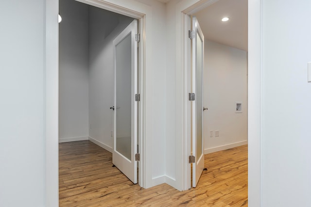 hall featuring light hardwood / wood-style floors