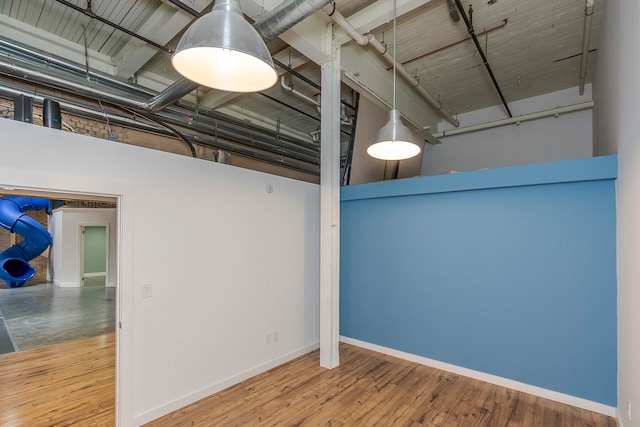 basement with wood-type flooring