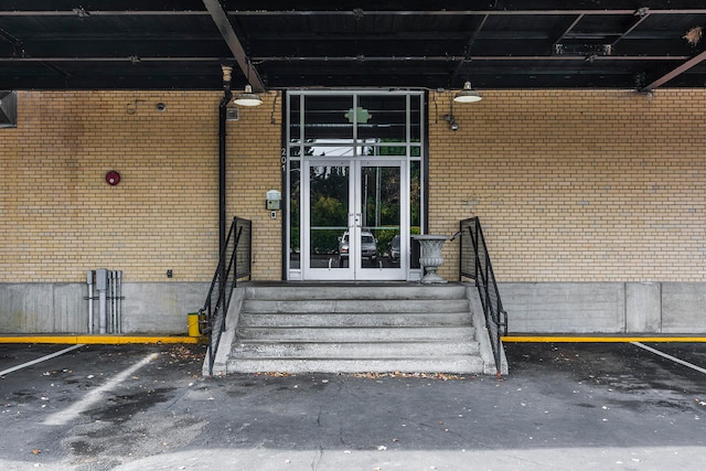 property entrance featuring french doors