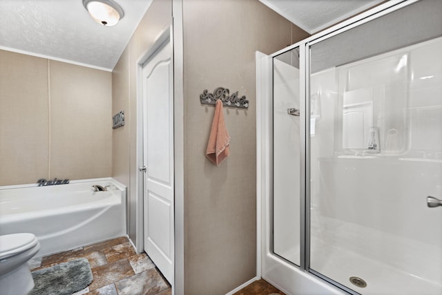 bathroom with plus walk in shower, a textured ceiling, and toilet