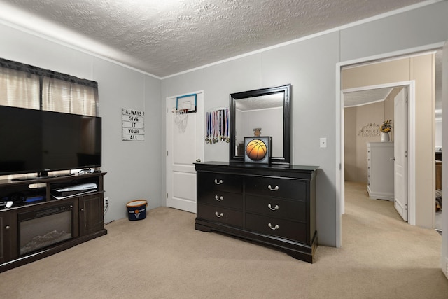 carpeted bedroom with a textured ceiling