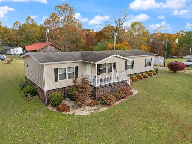 view of side of home featuring a yard