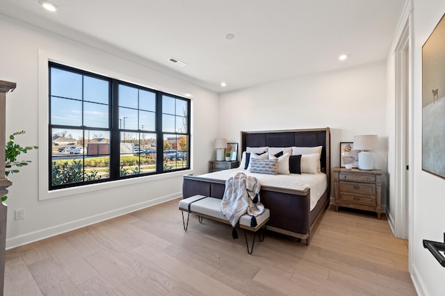 bedroom featuring light hardwood / wood-style floors