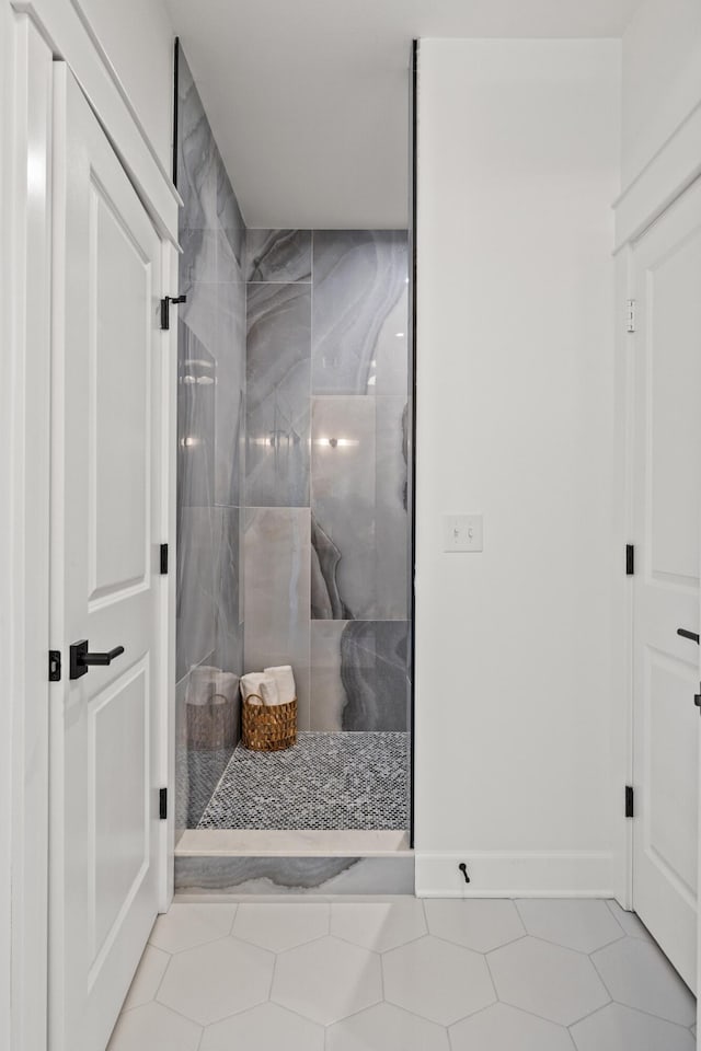 bathroom featuring a shower and tile patterned floors