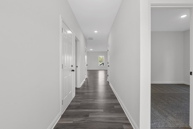 148 Nuthatch Trl, Georgetown, KY 40324 - hallway featuring recessed lighting, baseboards, and dark wood-type flooring