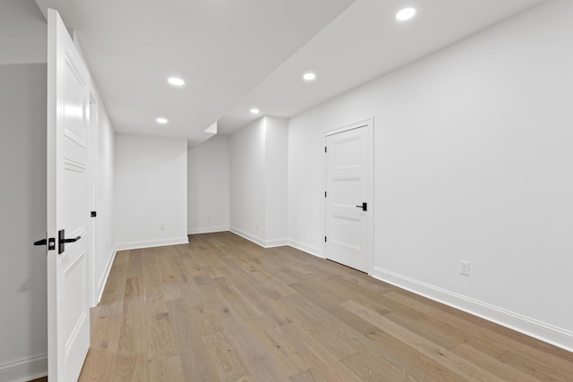 spare room featuring light hardwood / wood-style floors