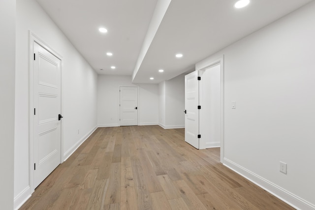 hall with light hardwood / wood-style flooring