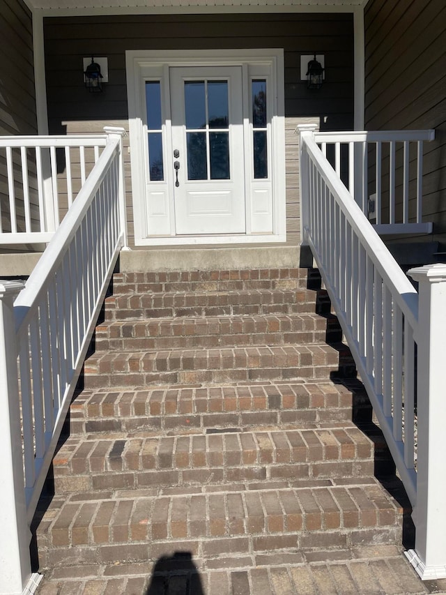 entrance to property with a porch