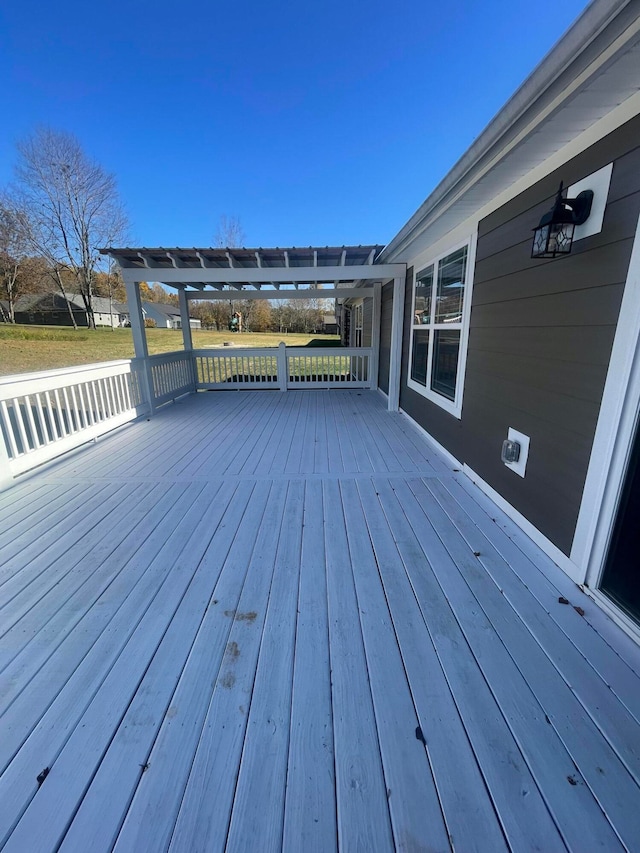 deck featuring a pergola