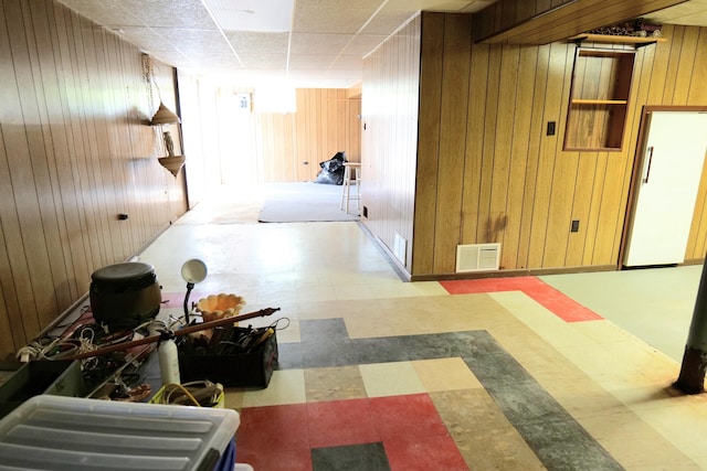 hallway with wooden walls