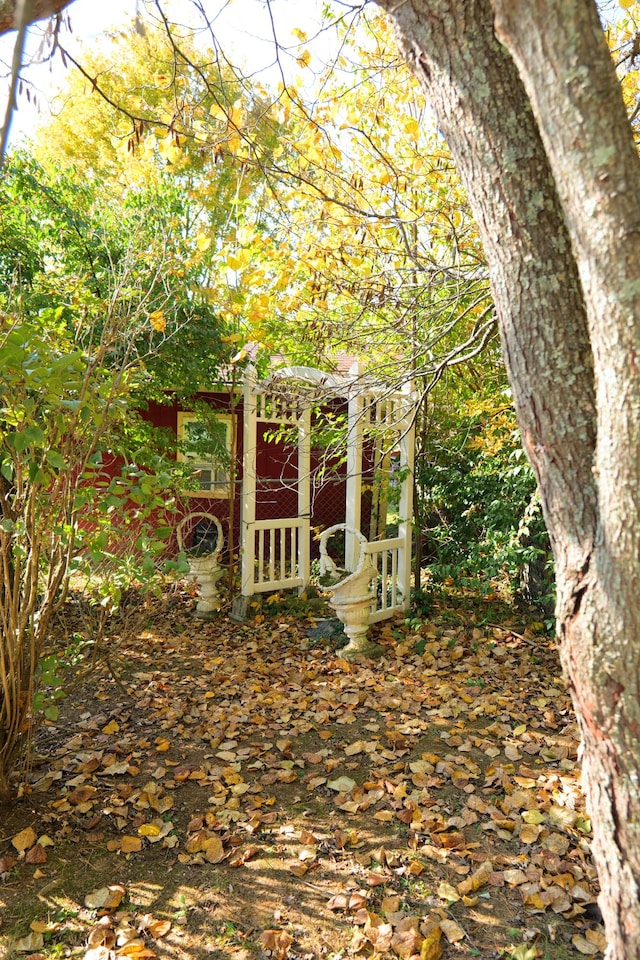 view of patio with an outbuilding