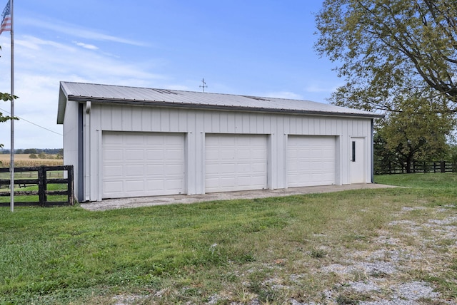 garage with a yard