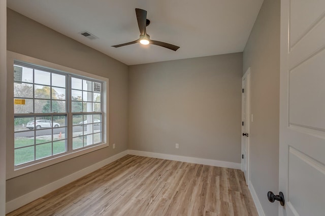 unfurnished room featuring light hardwood / wood-style flooring and ceiling fan