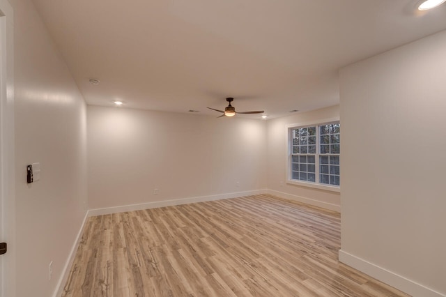 unfurnished room featuring light wood-type flooring and ceiling fan