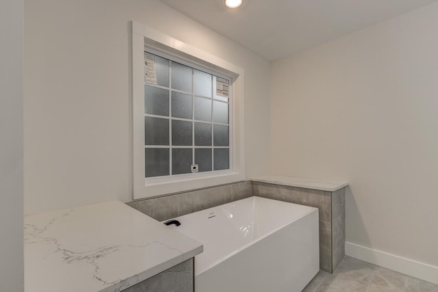 bathroom with a washtub