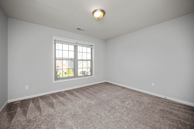 spare room with carpet flooring