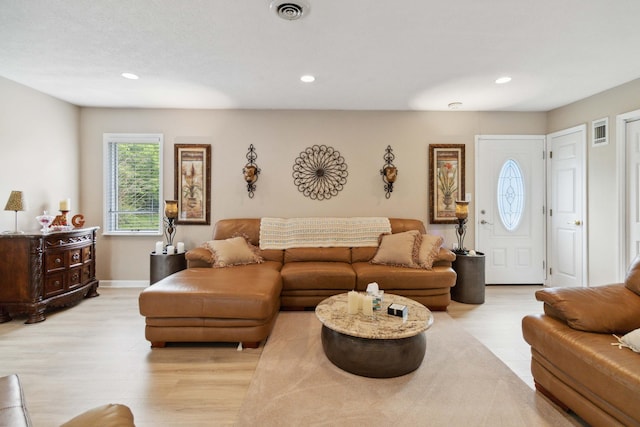 living room featuring light wood-type flooring