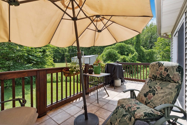 balcony featuring a grill and a patio