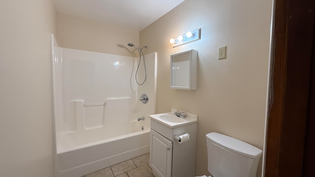 full bathroom with vanity, bathtub / shower combination, tile patterned flooring, and toilet