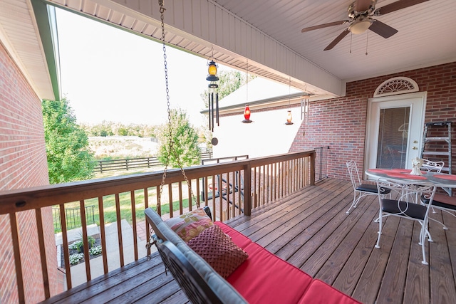 wooden terrace with ceiling fan