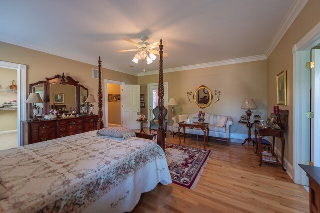 bedroom featuring ceiling fan, crown molding, and light wood-type flooring