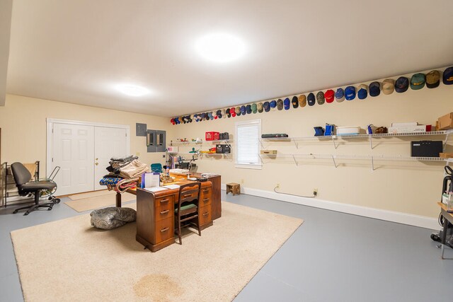 office area featuring concrete flooring