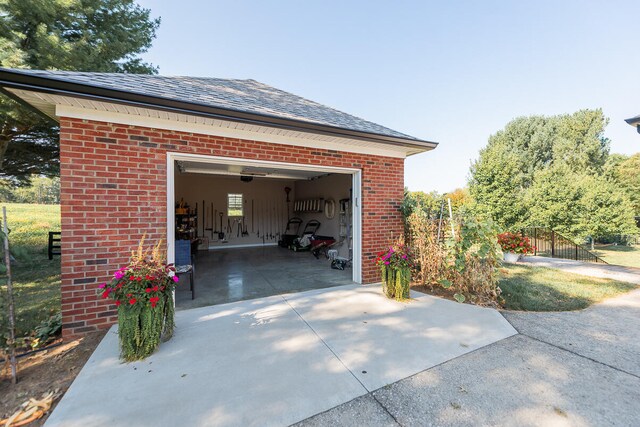 view of side of home featuring a garage