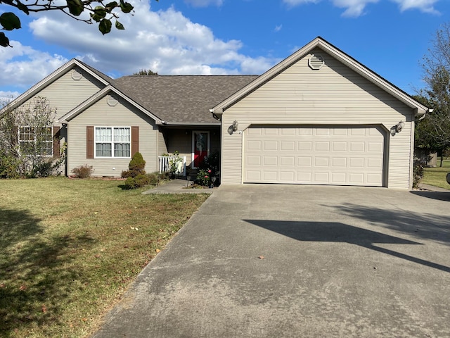 ranch-style home with a front yard and a garage