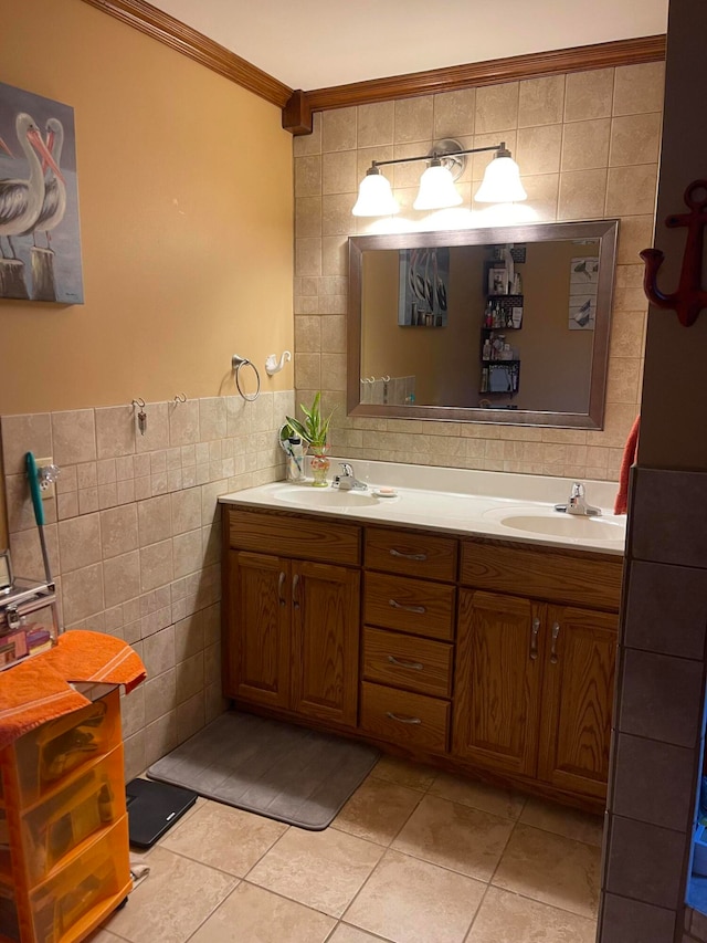 bathroom featuring vanity, crown molding, tile walls, and tile patterned flooring