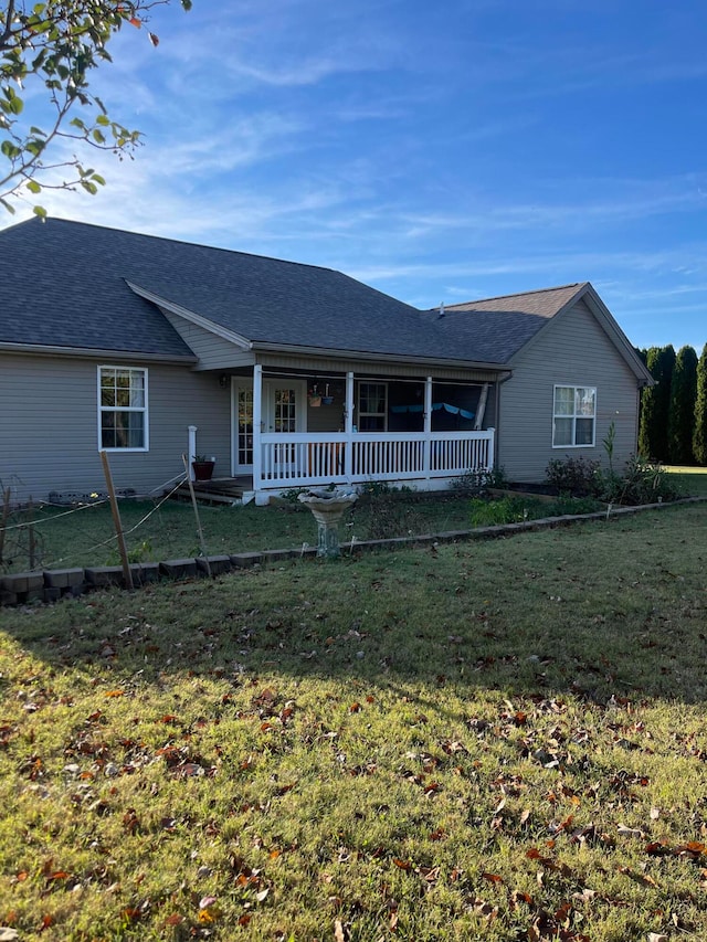 view of front of property with a front lawn