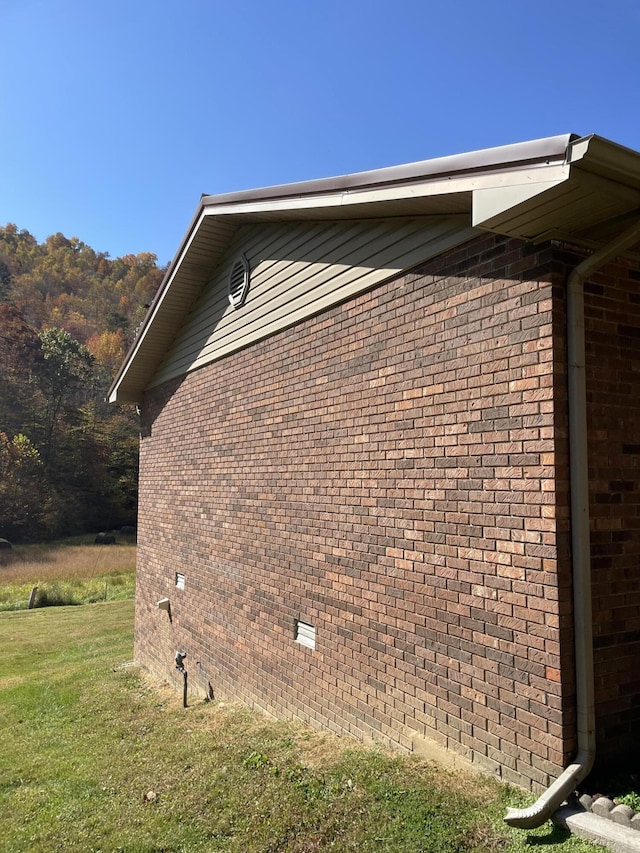 view of property exterior featuring a yard