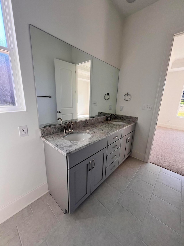 bathroom featuring vanity and tile patterned flooring