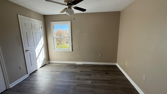 unfurnished bedroom featuring a textured ceiling, dark hardwood / wood-style floors, and ceiling fan