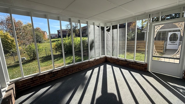 unfurnished sunroom with plenty of natural light