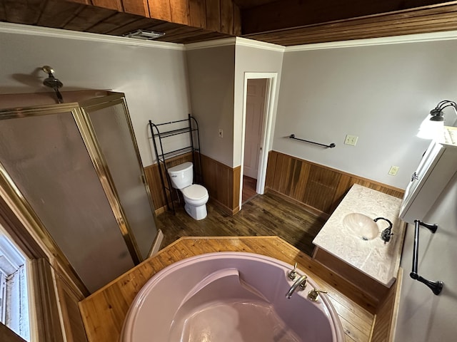 full bathroom featuring plus walk in shower, wood walls, wood-type flooring, toilet, and vanity